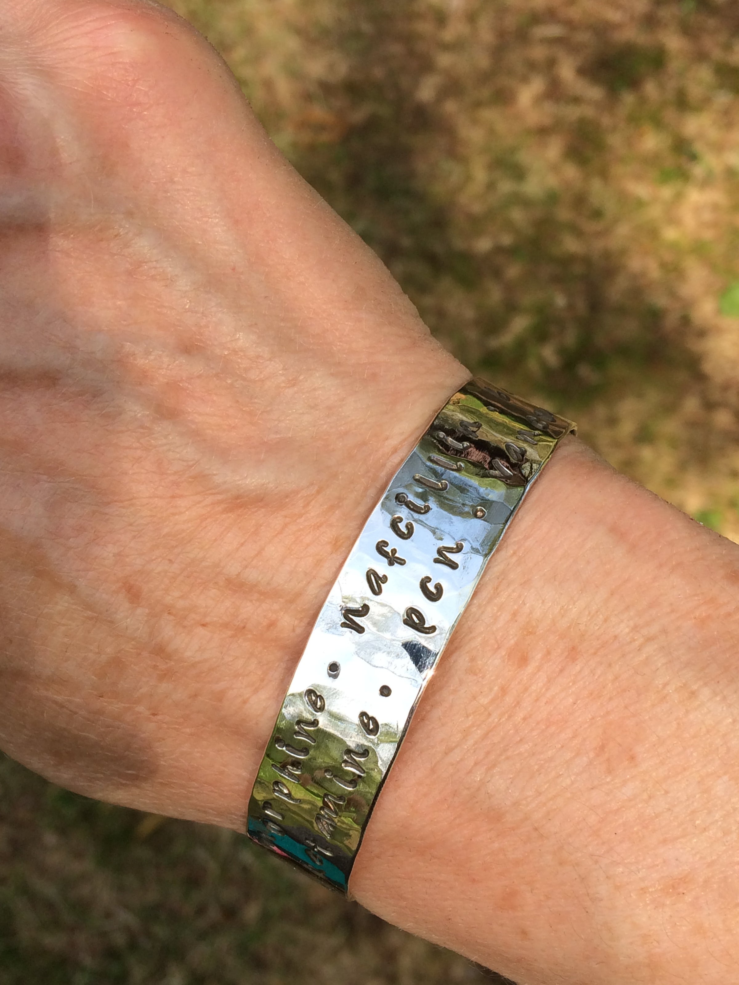Laura's medical bracelets top